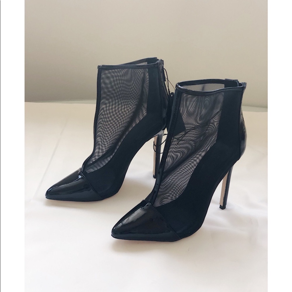 Black semi translucent heeled boots